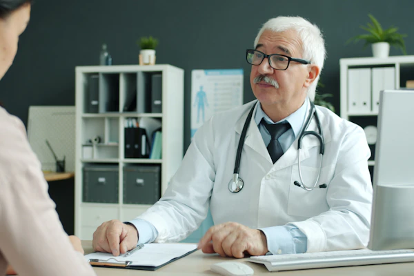 Doctor consulting with a patient in a modern clinic office