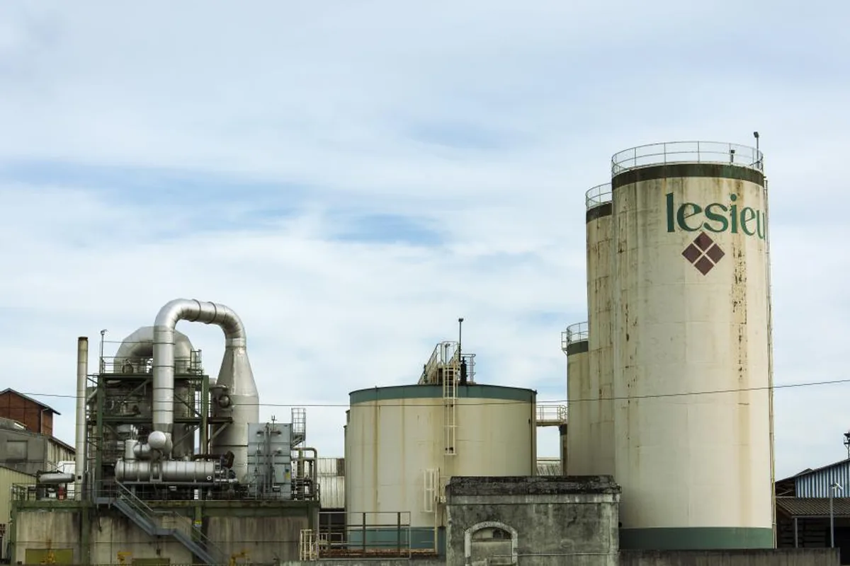 Storage silos and pipework at an industrial plant