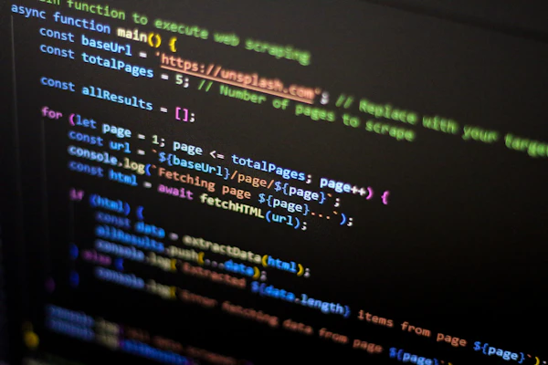 Computer screen showing lines of code, representing a SaaS product